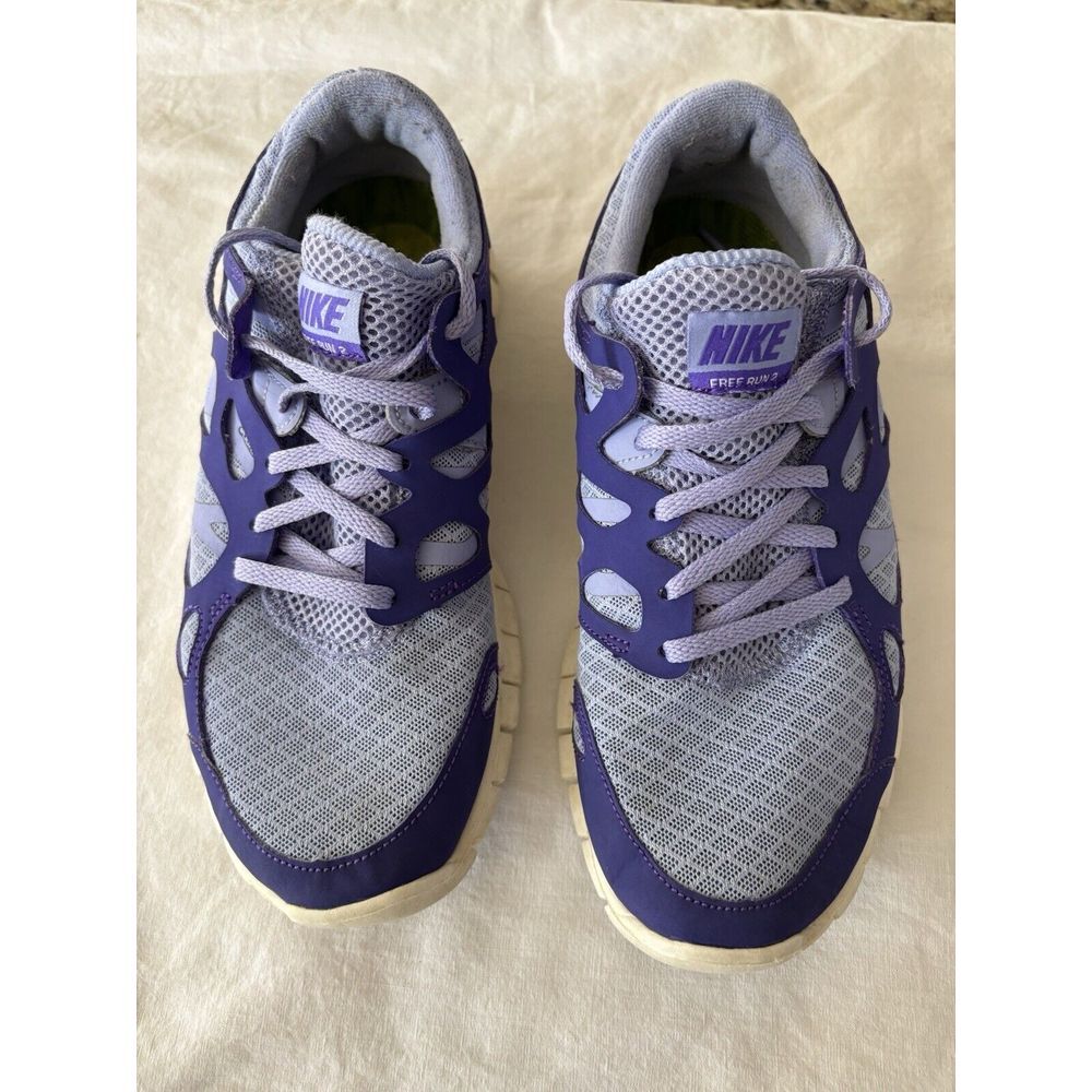 Purple Lady Nike's Shoes. Size 7 The‎ Style Is TANJUN. Nike Plus Free Run Two.